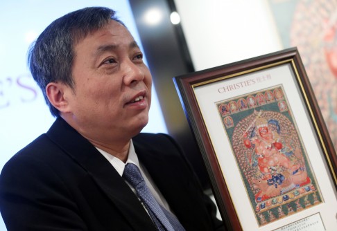 Il miliardario e collezionista cinese Liu Yiqian che ieri sera si è aggiudicato il Nu Couche (Nudo Disteso) di Modigliani per l'incredibile cifra di 170.4 milioni di dollari.